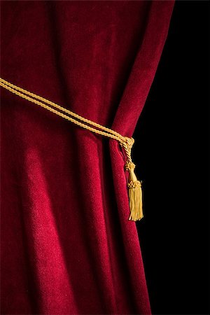 simsearch:400-07308316,k - Red velvet curtain with tassel. Close up black isolated curtain Stock Photo - Budget Royalty-Free & Subscription, Code: 400-07308309