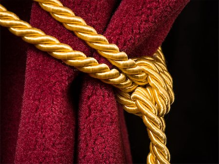 Red velvet curtain with tassel. Close up knot on rope Stock Photo - Budget Royalty-Free & Subscription, Code: 400-07308313
