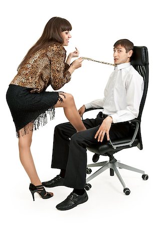 pulling a businessman's tie on a leather chair Photographie de stock - Aubaine LD & Abonnement, Code: 400-07308869