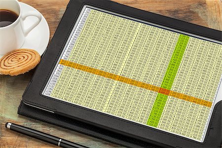 business concept - data spreadsheet on a digital tablet with a cup of coffee Fotografie stock - Microstock e Abbonamento, Codice: 400-07309458