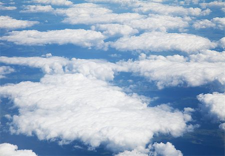 Blue and silver clouds background, view from airplane Photographie de stock - Aubaine LD & Abonnement, Code: 400-07300033