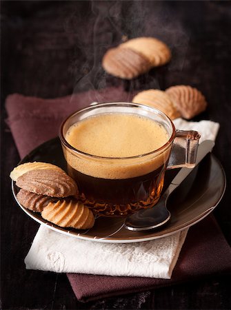 simsearch:400-07306295,k - Cup of coffee and chocolate cookies on a linen napkin. Stock Photo - Budget Royalty-Free & Subscription, Code: 400-07300154