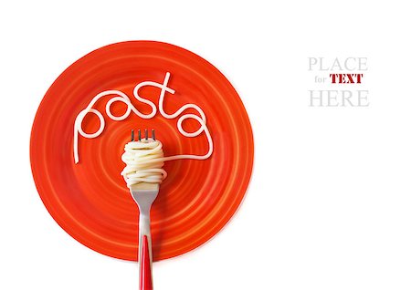 simsearch:400-04341378,k - Italian pasta spaghetti with fork on a red plate. Fotografie stock - Microstock e Abbonamento, Codice: 400-07300170