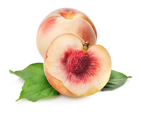 peach slice - Sweet delicious peaches isolated on a white background Stock Photo - Budget Royalty-Free & Subscription, Code: 400-07300623