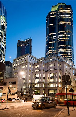 Taxi in City of London . Financial city of London in the night Stock Photo - Budget Royalty-Free & Subscription, Code: 400-07300899