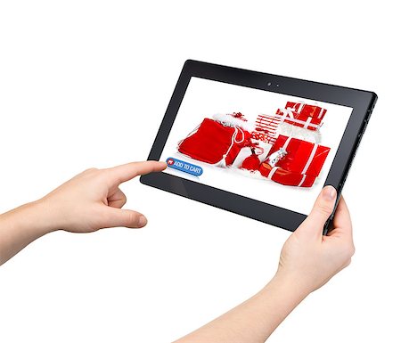 Online Christmas shopping  with hand pressing a touchscreen button Stockbilder - Microstock & Abonnement, Bildnummer: 400-07301070
