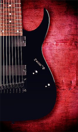 simsearch:400-05080507,k - black electric eight-string guitar, painted metal background Stock Photo - Budget Royalty-Free & Subscription, Code: 400-07301396