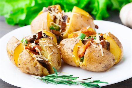 potato skins - Delicious baked potato with bacon and mushrooms Stock Photo - Budget Royalty-Free & Subscription, Code: 400-07301678
