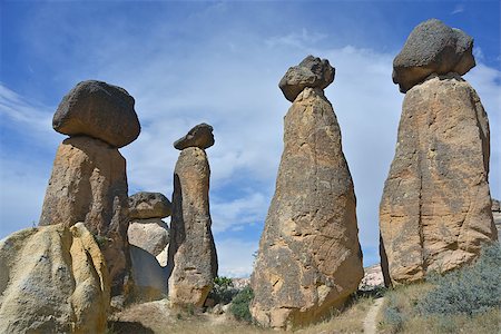 simsearch:841-02992026,k - These Fairy Chimneys rock formation are situated nearly Goreme in Cappadocia - Turkey. The area is a popular tourist destination. Foto de stock - Super Valor sin royalties y Suscripción, Código: 400-07301710