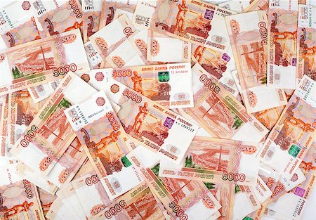 rimborso - Heap of five thousand russian rubles banknotes as background Fotografie stock - Microstock e Abbonamento, Codice: 400-07302102