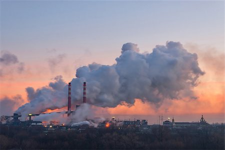 Chemical factory in the morning, with pipes and polluting smoke, long exposure Stock Photo - Budget Royalty-Free & Subscription, Code: 400-07302242