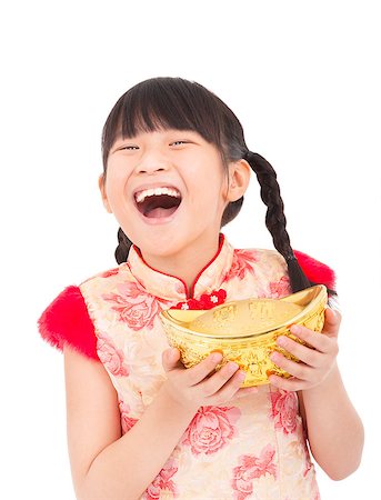 simsearch:400-07290680,k - chinese new year. little girl showing  gold for luck. chinese meaning to get rich and happy Stock Photo - Budget Royalty-Free & Subscription, Code: 400-07302348
