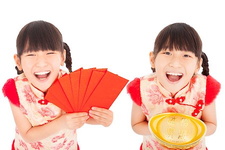 happy  chinese new year. little girl showing red envelope and gold for lucky. chinese mean get rich and happy Stock Photo - Budget Royalty-Free & Subscription, Code: 400-07302349