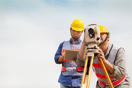 simsearch:400-07304331,k - Surveyor engineer taking measurements Stock Photo - Budget Royalty-Free & Subscription, Code: 400-07302362