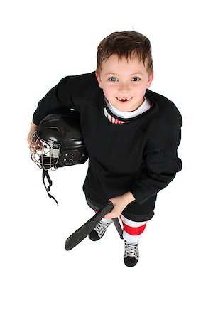 Young boy in ice hockey gear against white Stock Photo - Budget Royalty-Free & Subscription, Code: 400-07302617