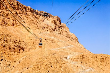 Cable car to the Masada fortress in Judaean Desert in Israel Fotografie stock - Microstock e Abbonamento, Codice: 400-07302645