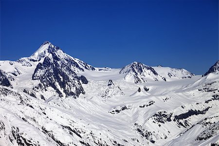 simsearch:400-04588712,k - Winter Caucasus Mountains in nice sun day. Georgia, view from ski resort Gudauri. Stock Photo - Budget Royalty-Free & Subscription, Code: 400-07302668