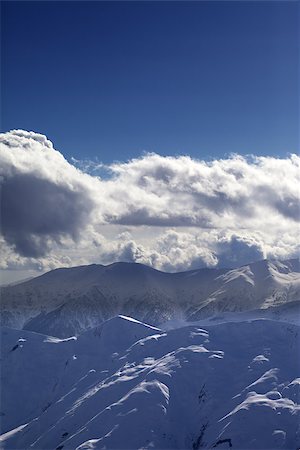 simsearch:400-07211845,k - Evening mountains and sunlight clouds. View from ski resort Gudauri. Caucasus Mountains, Georgia. Stockbilder - Microstock & Abonnement, Bildnummer: 400-07302674