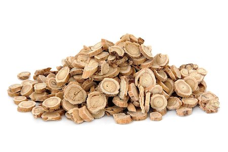 Astragalus root herb used in chinese herbal medicine over white background. Huang qi. Stock Photo - Budget Royalty-Free & Subscription, Code: 400-07303176