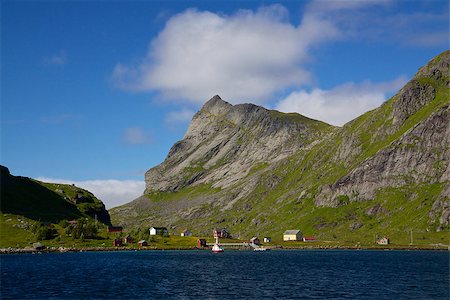 simsearch:400-06946273,k - Picturesque fjord on Lofoten islands in Norway surrounded by towering mountain peaks and small fishing village Photographie de stock - Aubaine LD & Abonnement, Code: 400-07303226