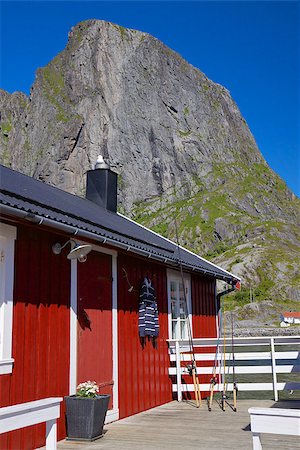 simsearch:400-06557083,k - Typical red rorbu fishing hut by the fjord on Lofoten islands in Norway Stockbilder - Microstock & Abonnement, Bildnummer: 400-07303221