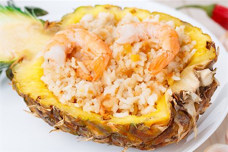 simsearch:656-02702879,k - Pineapple fried rice served in fresh pineapple Photographie de stock - Aubaine LD & Abonnement, Code: 400-07303508