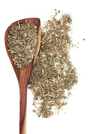 Agrimony herb used in herbal medicine in a wooden spoon over white background. Photographie de stock - Aubaine LD & Abonnement, Code: 400-07303843