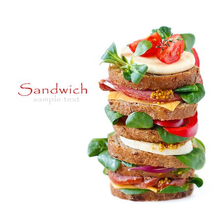 simsearch:400-07319721,k - Sandwiches with sausage, cheese, vegetables and mustard on crusty fresh sliced rye bread. Stockbilder - Microstock & Abonnement, Bildnummer: 400-07314769