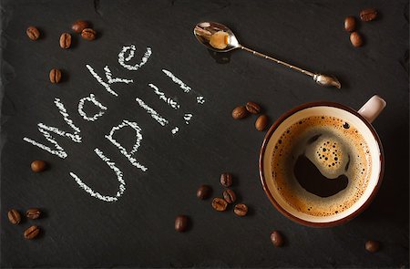 simsearch:400-04849433,k - Cup of coffee and coffee beans on black chalkboard. Stockbilder - Microstock & Abonnement, Bildnummer: 400-07314800