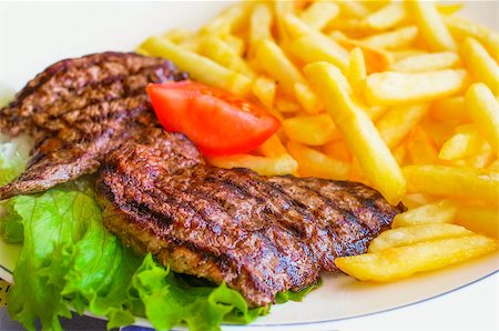 simsearch:400-05664697,k - juicy steak beef meat with tomato and potatoes Stock Photo - Budget Royalty-Free & Subscription, Code: 400-07315774