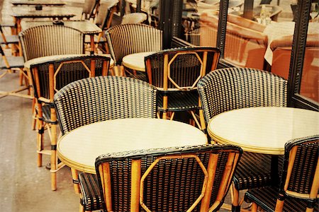 old-fashioned coffee terrace with tables and chairs,paris France Stock Photo - Budget Royalty-Free & Subscription, Code: 400-07315777