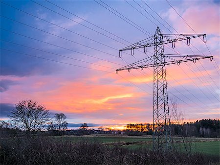 electricity pole silhouette - Electricity pylon at sunset with evening sky Foto de stock - Super Valor sin royalties y Suscripción, Código: 400-07315856