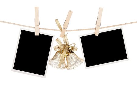 simsearch:400-06463913,k - Blank photo frames and christmas decor hanging on the clothesline. Isolated on white background Foto de stock - Super Valor sin royalties y Suscripción, Código: 400-07316681