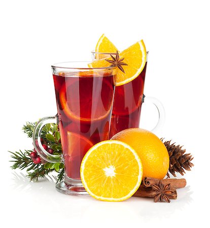 Christmas mulled wine with orange and spices. Isolated on white background Stock Photo - Budget Royalty-Free & Subscription, Code: 400-07316734