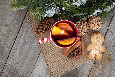 Christmas mulled wine with fir tree, gingerbread and spices on wooden table Stock Photo - Budget Royalty-Free & Subscription, Code: 400-07316744
