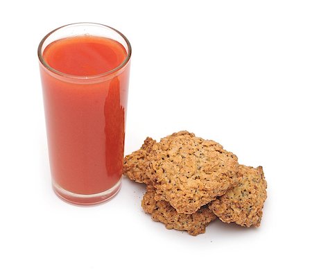 simsearch:400-05911768,k - tomato juice glass with cookies isolated on white background Photographie de stock - Aubaine LD & Abonnement, Code: 400-07317008