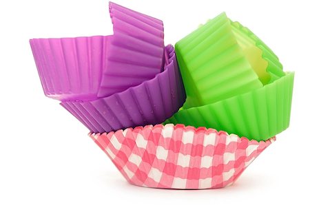 stack of vibrant cupcake wrappersisolated on white. Fotografie stock - Microstock e Abbonamento, Codice: 400-07317023