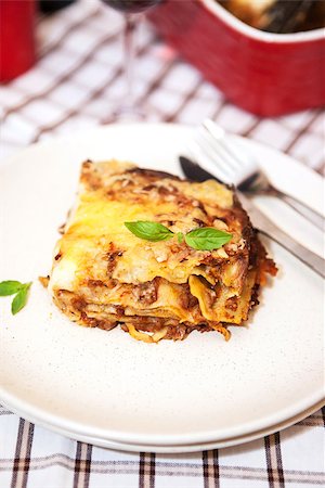 simsearch:400-06686774,k - A piece of meat  and tomato lasagna (Lasagna Bolognese) on the plate Stock Photo - Budget Royalty-Free & Subscription, Code: 400-07317443