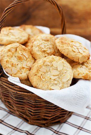 simsearch:400-08428825,k - Oatmeal cookies with almond in a basket on a wooden background Stock Photo - Budget Royalty-Free & Subscription, Code: 400-07317453