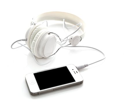 White headphones with mobile smartphone Stock Photo - Budget Royalty-Free & Subscription, Code: 400-07318909