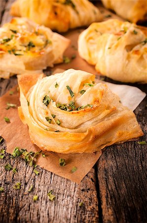 Homemade pastry with the cheese and chive.Selective focus on the front pastry Stockbilder - Microstock & Abonnement, Bildnummer: 400-07318925
