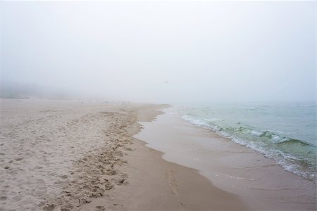 simsearch:400-07248425,k - Foggy weather by the sea. Baltic beach in Leba, Poland. Photographie de stock - Aubaine LD & Abonnement, Code: 400-07318944