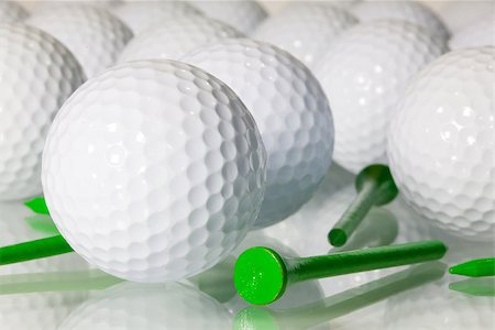 simsearch:400-07218310,k - Different golf balls on a glass table Photographie de stock - Aubaine LD & Abonnement, Code: 400-07319231