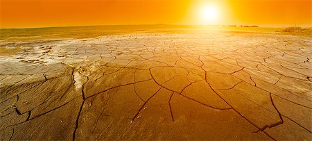 simsearch:400-05706113,k - Dry cracked land with a setting sun. Panorama Stock Photo - Budget Royalty-Free & Subscription, Code: 400-07319252