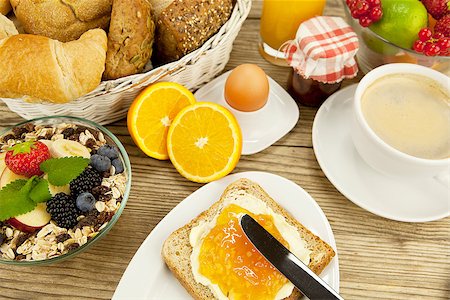 tasty breackfast with toast and marmelade on wooden background Stock Photo - Budget Royalty-Free & Subscription, Code: 400-07319745