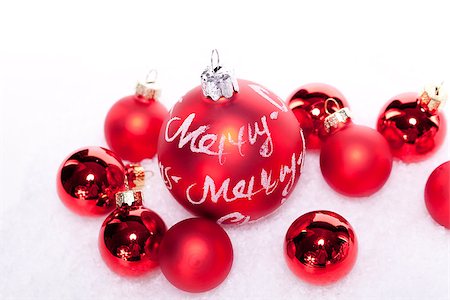simsearch:400-08302769,k - christmas decoration festive red bauble in snow isolated copy space Photographie de stock - Aubaine LD & Abonnement, Code: 400-07319865