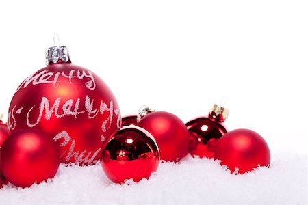 simsearch:400-08302769,k - christmas decoration festive red bauble in snow isolated copy space Photographie de stock - Aubaine LD & Abonnement, Code: 400-07319863