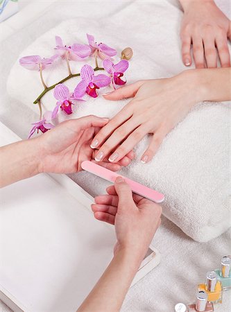 simsearch:400-06061806,k - professional manicurist doing a manicure natural look Stock Photo - Budget Royalty-Free & Subscription, Code: 400-07319891