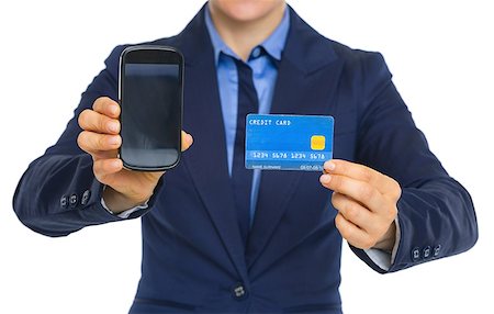 simsearch:400-07106831,k - Closeup on business woman showing phone and credit card Stockbilder - Microstock & Abonnement, Bildnummer: 400-07310245