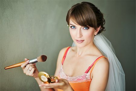 Young bride doing make-up in the morning. Stock Photo - Budget Royalty-Free & Subscription, Code: 400-07311893